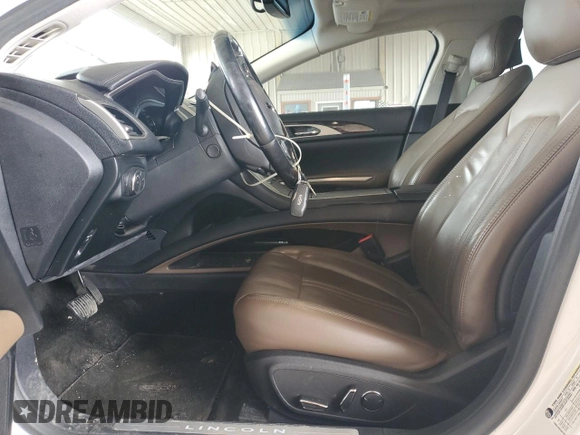 2016 Lincoln MKZ with VIN 3LN6L2J9XGR615607, listed as a Copart auction lot 53950915 with 100,368 mi miles and Salvage Title. Bid and sale history available at DreamBid. Image 7.