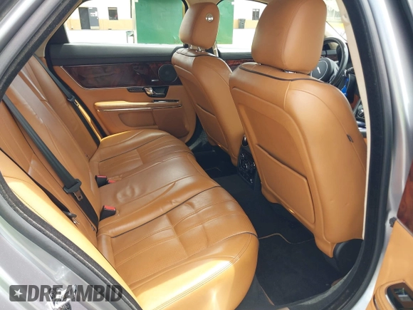 2013 Jaguar XJ with VIN SAJWJ1CD4D8V46305, listed as a IAAI auction lot 42637329 with 101,532 mi miles and . Bid and sale history available at DreamBid. Image 8.