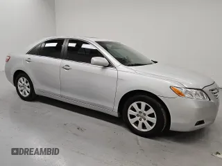 2009 Toyota Camry LE z VIN 4T1BK46K89U595880, wystawiony jako Copart lot #55069935 z przebiegiem 265 831 mil mil oraz Czysty tytuł • Clean title. Historia ofert i sprzedaży dostępna na DreamBid. Obrazek 4.