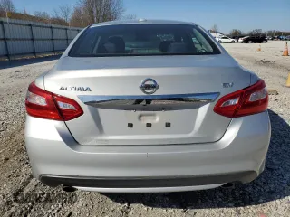 2016 Nissan Altima SV with VIN 1N4AL3AP5GC225344, listed as a Copart auction lot 48827185 with 74,250 mi miles and Salvage Title. Bid and sale history available at DreamBid. Image 6.