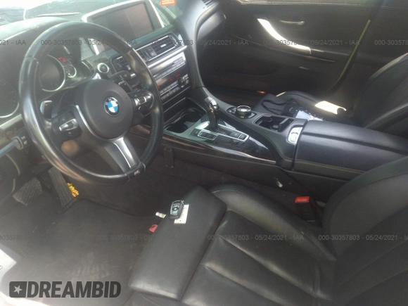 2015 BMW 6 Series 640i z VIN WBA6A0C57FGB53750, wystawiony jako IAAI lot #30357803 z przebiegiem 59 462 mil mil oraz . Historia ofert i sprzedaży dostępna na DreamBid. Obrazek 5.