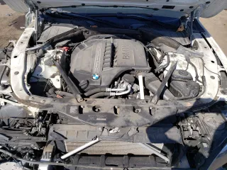 2014 BMW 7 Series 740Li xDrive with VIN WBAYF4C50ED281830, listed as a Copart auction lot 48557035 with 129,497 mi miles and Salvage Title. Bid and sale history available at carsss.com. Image 11.