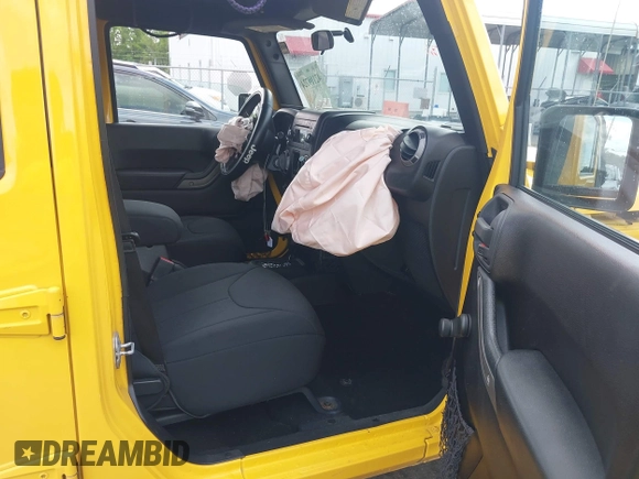 2015 Jeep Wrangler Unlimited Willys Wheeler with VIN 1C4BJWDG2FL643375, listed as a IAAI auction lot 42109724 with 112,357 mi miles and . Bid and sale history available at DreamBid. Image 5.