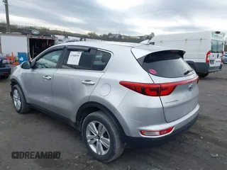 2018 Kia Sportage LX with VIN KNDPMCAC4J7437926, listed as a IAAI auction lot 41968696 with 139,304 mi miles. Bid and sale history available at carsss.com. Image 3.