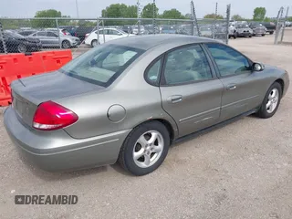 2004 Ford Taurus z VIN 1FAHP55U74G112479, wystawiony jako IAAI lot #42207775 z przebiegiem 97 491 mil mil oraz . Historia ofert i sprzedaży dostępna na DreamBid. Obrazek 4.