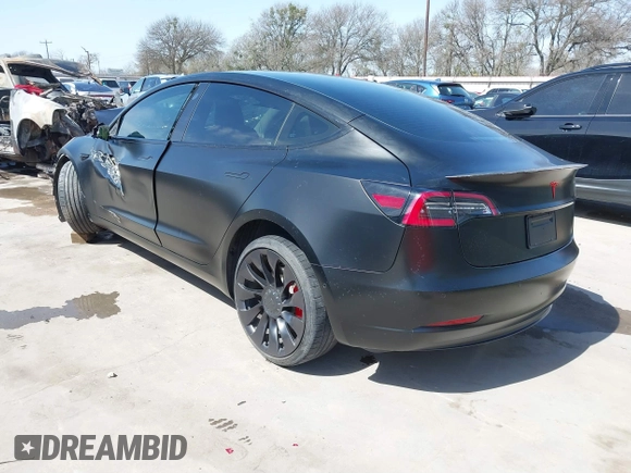 2022 Tesla Model 3 Performance with VIN 5YJ3E1EC6NF104475, listed as a IAAI auction lot 41734724 with 31,717 mi miles and . Bid and sale history available at carsss.com. Image 3.