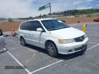 2003 Honda Odyssey EX-L z VIN 5FNRL18033B095684, wystawiony jako IAAI lot #42289617 z przebiegiem 174 336 mil mil oraz . Historia ofert i sprzedaży dostępna na DreamBid. Obrazek 1.