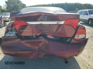 2011 Honda Civic LX with VIN 19XFA1F54BE001632, listed as a Copart auction lot 70900264 with 209,840 mi miles and Salvage Title. Bid and sale history available at DreamBid. Image 6.