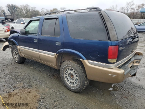 1999 GMC Jimmy SLE with VIN 1GKDT13W8X2545509, listed as a Copart auction lot 81608944 with 130,881 mi miles and Salvage Title. Bid and sale history available at carsss.com. Image 2.