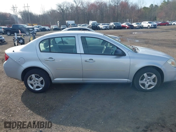 2007 Chevrolet Cobalt LS with VIN 1G1AK55F777301061, listed as a IAAI auction lot 41899079 with 148,197 mi miles and . Bid and sale history available at DreamBid. Image 13.