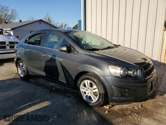 2014 Chevrolet Sonic LT with VIN 1G1JC5SH7E4220059, listed as a Copart auction lot 49877765 with 136,896 mi miles and Salvage Title. Bid and sale history available at DreamBid. Image 4.