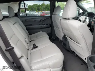 2023 Honda Passport EX-L with VIN 5FNYF8H58PB015048, listed as a Copart auction lot 66259043 with 7,142 mi miles. Bid and sale history available at carsss.com. Image 10.