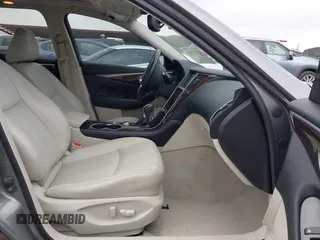 2015 Infiniti Q50 Premium z VIN JN1BV7AR7FM408015, wystawiony jako IAAI lot #42083301 z przebiegiem 58 817 mil mil oraz . Historia ofert i sprzedaży dostępna na DreamBid. Obrazek 5.