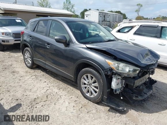 2016 Mazda CX-5 Touring with VIN JM3KE2CYXG0647921, listed as a IAAI auction lot 41948068 with 133,733 mi miles and . Bid and sale history available at DreamBid. Image 1.