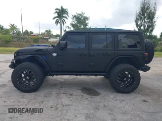 2018 Jeep Wrangler Unlimited Sport S z VIN 1C4HJXDG2JW228483, wystawiony jako IAAI lot #41710364 z przebiegiem 56 970 mil mil oraz . Historia ofert i sprzedaży dostępna na DreamBid. Obrazek 14.