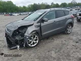 2014 Ford Escape Titanium с VIN 1FMCU0J98EUC15796, выставлен на аукционе Copart как лот 54152125 с пробегом 145 435 миль миль и Списание • Salvage title. История ставок и продаж доступна на DreamBid. Изображение 1.