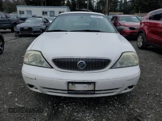 2004 Mercury Sable GS z VIN 1MEFM50U44A624610, wystawiony jako Copart lot #85780554 z przebiegiem 215 046 mil mil oraz Czysty tytuł • Clean title. Historia ofert i sprzedaży dostępna na DreamBid. Obrazek 5.