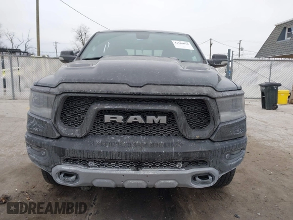 2019 Ram 1500 Rebel z VIN 1C6SRFLT6KN599362, wystawiony jako IAAI lot #41560018 z przebiegiem Nie podano mil oraz . Historia ofert i sprzedaży dostępna na DreamBid. Obrazek 12.
