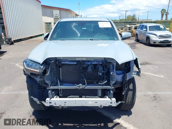 2019 Toyota Tacoma SR with VIN 3TMCZ5AN7KM213537, listed as a IAAI auction lot 42442068 with 39,969 mi miles and . Bid and sale history available at DreamBid. Image 13.