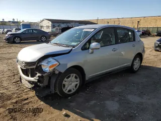 2011 Nissan Versa S with VIN 3N1BC1CP9BL401389, listed as a Copart auction lot 52322385 with 97,232 mi miles and Salvage title. Bid and sale history available at DreamBid. Image 1.