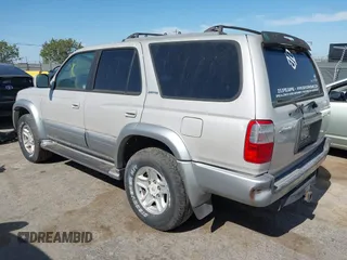2000 Toyota 4Runner Limited z VIN JT3HN87R0Y9036323, wystawiony jako IAAI lot #42369188 z przebiegiem 283 128 mil mil oraz . Historia ofert i sprzedaży dostępna na DreamBid. Obrazek 3.