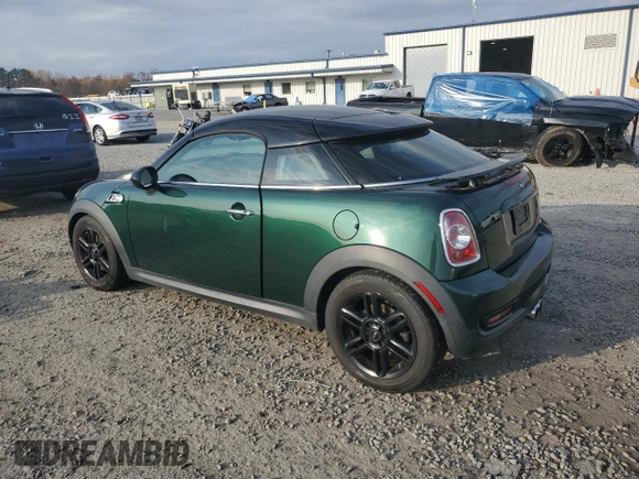 2013 MINI Coupe S z VIN WMWSX3C51DT409008, wystawiony jako Copart lot #82781914 z przebiegiem 122 465 mil mil oraz Czysty tytuł • Clean title. Historia ofert i sprzedaży dostępna na DreamBid. Obrazek 2.