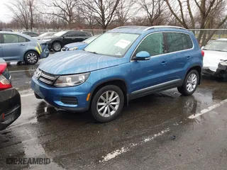2017 Volkswagen Tiguan Wolfsburg Edition with VIN WVGSV7AX9HK007880, listed as a IAAI auction lot 41111974 with 89,804 mi miles. Bid and sale history available at carsss.com. Image 17.