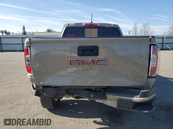 2022 GMC Canyon 4WD Elevation z VIN 1GTG6CEN5N1298548, wystawiony jako Copart lot #41426075 z przebiegiem 15 947 mil mil oraz Szkoda całkowita • Salvage title. Historia ofert i sprzedaży dostępna na DreamBid. Obrazek 6.