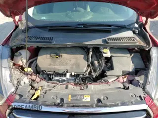 2018 Ford Escape SE z VIN 1FMCU9GD3JUC30233, wystawiony jako Copart lot #64203535 z przebiegiem 89 790 mil mil oraz Szkoda całkowita • Salvage title. Historia ofert i sprzedaży dostępna na DreamBid. Obrazek 14.