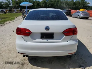 2014 Volkswagen Jetta S with VIN 3VW2K7AJXEM415024, listed as a Copart auction lot 61578155 with 115,041 mi miles and Salvage title. Bid and sale history available at DreamBid. Image 6.