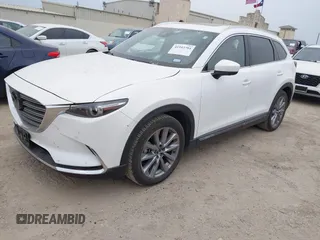 2023 Mazda CX-9 Grand Touring с VIN JM3TCBDY0P0634099, выставлен на аукционе IAAI как лот 41943704 с пробегом 5 615 миль миль и . История ставок и продаж доступна на DreamBid. Изображение 19.
