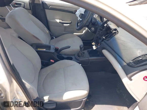 2010 Kia Forte LX with VIN KNAFT4A27A5080973, listed as a IAAI auction lot 42012776 with 244,485 mi miles. Bid and sale history available at carsss.com. Image 5.