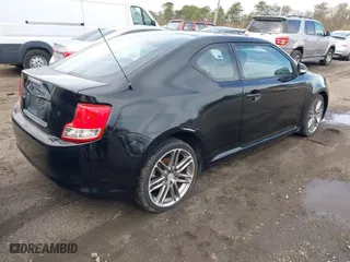 2011 Scion tC with VIN JTKJF5C74B3014552, listed as a IAAI auction lot 42004369 with 232,588 mi miles. Bid and sale history available at carsss.com. Image 4.