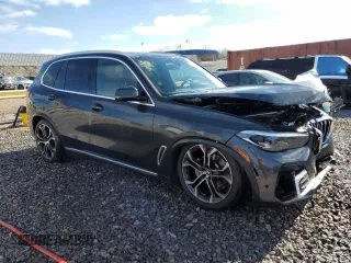 2023 BMW X5 sDrive40i with VIN 5UXCR4C0XP9P08573, listed as a Copart auction lot 85560524 with 67,939 mi miles and Salvage title. Bid and sale history available at DreamBid. Image 4.