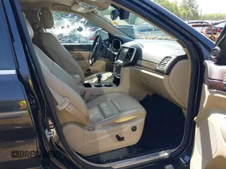 2014 Jeep Grand Cherokee Limited with VIN 1C4RJEBM2EC300212, listed as a IAAI auction lot 39498423 with 99,938 mi miles. Bid and sale history available at carsss.com. Image 5.