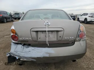 2003 Nissan Altima SE z VIN 1N4BL11D53C290140, wystawiony jako Copart lot #54163955 z przebiegiem 183 313 mil mil oraz Szkoda całkowita • Salvage title. Historia ofert i sprzedaży dostępna na DreamBid. Obrazek 6.