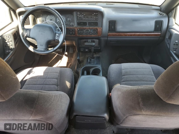 1998 Jeep Grand Cherokee Laredo with VIN 1J4GZ58S5WC165213, listed as a Copart auction lot 77611434 with 168,688 mi miles and Salvage Title. Bid and sale history available at carsss.com. Image 8.
