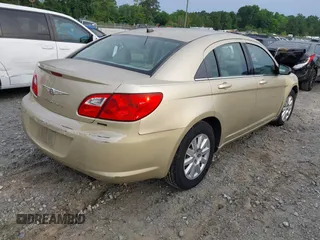 2010 Chrysler Sebring Touring z VIN 1C3CC4FBXAN210425, wystawiony jako IAAI lot #42275197 z przebiegiem 123 200 mil mil oraz . Historia ofert i sprzedaży dostępna na DreamBid. Obrazek 4.