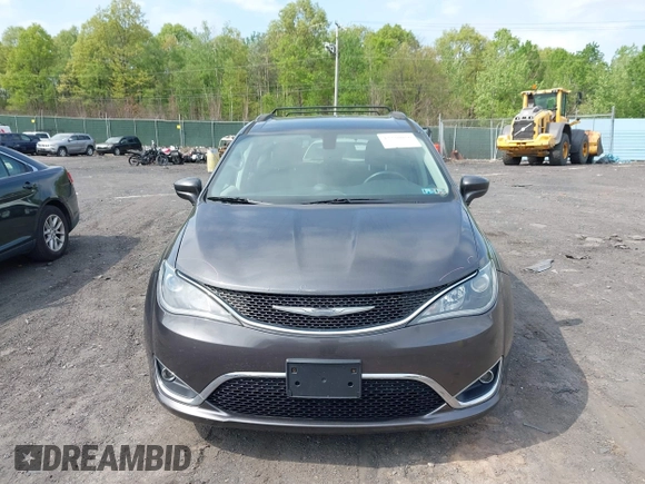 2017 Chrysler Pacifica Touring L with VIN 2C4RC1BG5HR705277, listed as a IAAI auction lot 42230036 with 75,287 mi miles and . Bid and sale history available at DreamBid. Image 12.