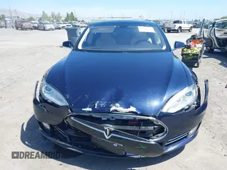 2014 Tesla Model S 60 with VIN 5YJSA1H12EFP46760, listed as a IAAI auction lot 42344596 with 106,252 mi miles and . Bid and sale history available at DreamBid. Image 12.