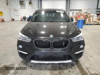 2017 BMW X1 xDrive28i with VIN WBXHT3Z39H4A51967, listed as a Copart auction lot 58843125 with 108,415 mi miles and Clean title. Bid and sale history available at DreamBid. Image 5.