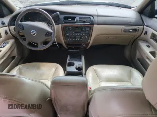 2001 Mercury Sable LS Premium with VIN 1MEHM55S51A604989, listed as a Copart auction lot 57890935 with 113,793 mi miles and Salvage title. Bid and sale history available at DreamBid. Image 8.