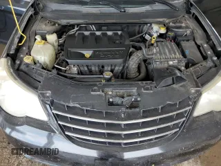 2010 Chrysler Sebring Limited with VIN 1C3CC5FB2AN229671, listed as a Copart auction lot 62181015 with 229,390 mi miles and Salvage title. Bid and sale history available at DreamBid. Image 11.