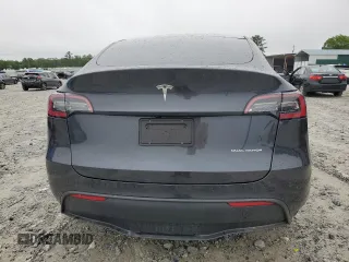 2024 Tesla Model Y Long Range with VIN 7SAYGAEE7RF005786, listed as a Copart auction lot 58415195 with 8,700 mi miles and Salvage title. Bid and sale history available at DreamBid. Image 6.