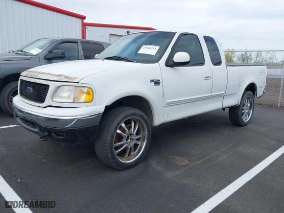 2000 Ford F-150 XL with VIN 1FTRX18W0YNA85809, listed as a IAAI auction lot 41848764 with 1 mi miles. Bid and sale history available at carsss.com. Image 2.