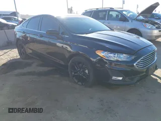 2019 Ford Fusion SE with VIN 3FA6P0HDXKR148954, listed as a IAAI auction lot 41313299 with 146,236 mi miles. Bid and sale history available at carsss.com. Image 1.