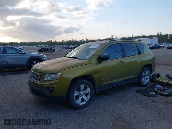 2012 Jeep Compass Sport with VIN 1C4NJCBA9CD633975, listed as a IAAI auction lot 42083500 with 190,412 mi miles and . Bid and sale history available at carsss.com. Image 2.