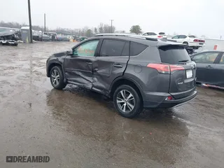 2018 Toyota RAV4 XLE with VIN 2T3RFREV5JW798328, listed as a IAAI auction lot 41868104 with 61,076 mi miles. Bid and sale history available at carsss.com. Image 3.