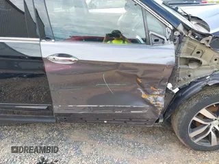 2017 Honda Pilot Touring with VIN 5FNYF5H91HB038268, listed as a IAAI auction lot 42786448 with 62,195 mi miles and . Bid and sale history available at DreamBid. Image 19.