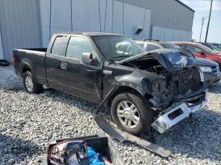 2004 Ford F-150 XL with VIN 1FTPX12594NC63511, listed as a Copart auction lot 57805915 with 172,381 mi miles and Salvage title. Bid and sale history available at DreamBid. Image 4.